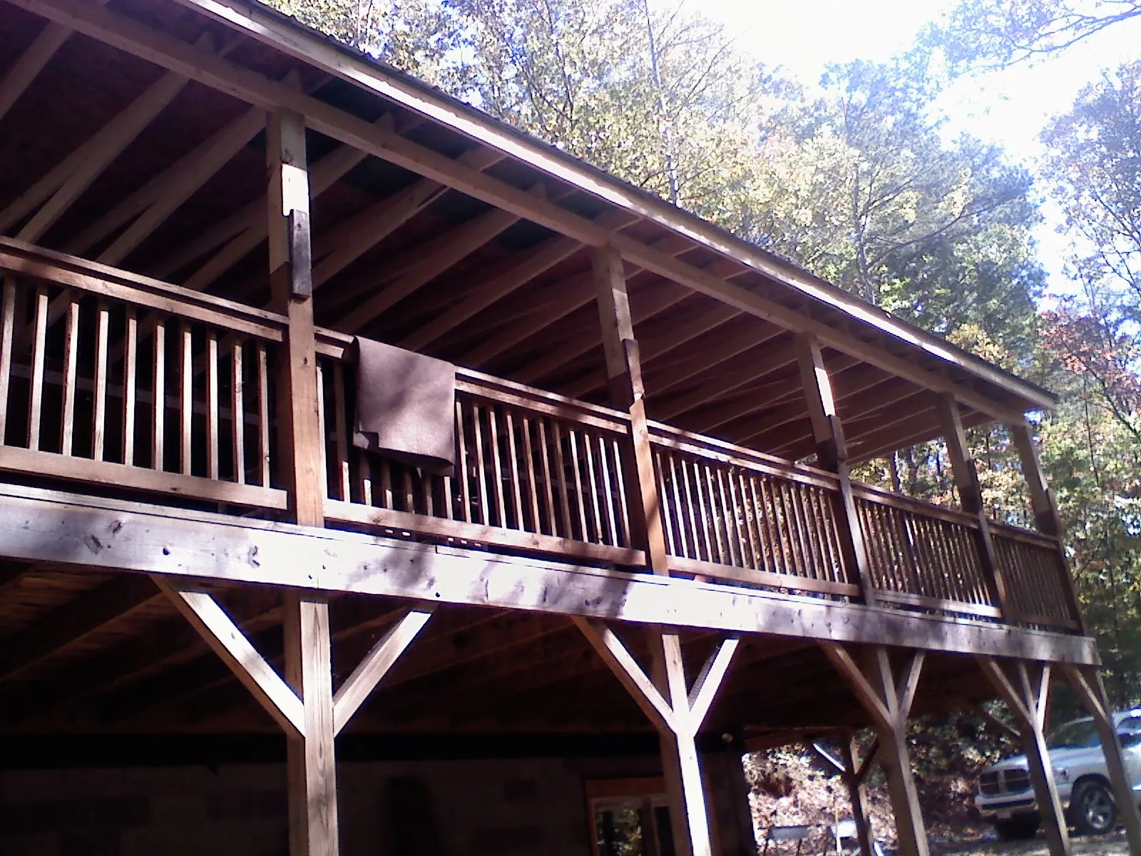 Timber framing under a new elevated porch and deck — Roof Leak Repair in Long Island City by Roofing Brothers
